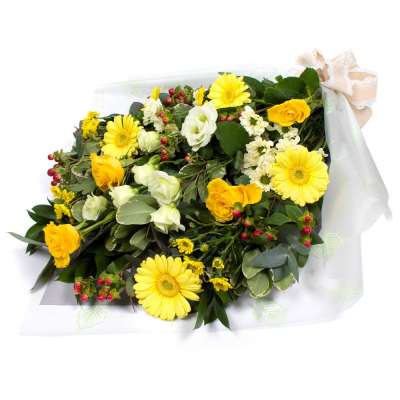 Sympathy Flowers SYM-334 - A selection of yellow, cream and white flowers with contrasting foliage in cellophane.
