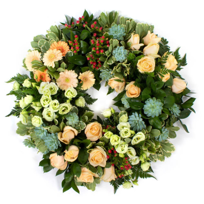 Eco Wreath SYM-354 - This open style wreath is designed on a biodegradable eco base. Made to order by our skilled florists, let us know what colour combination you would prefer, and we’ll select the best available flowers.
