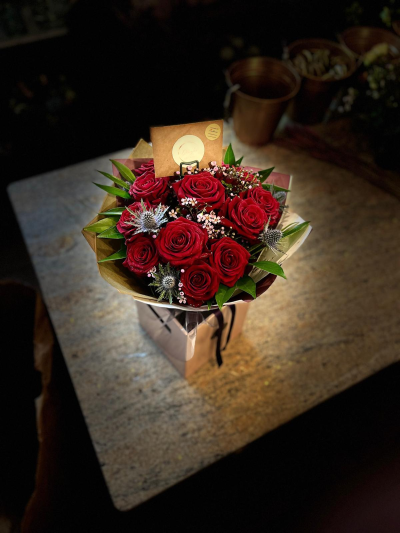 Valentines Premium Large Headed Red Rose Bouquet - Using only the finest Porta Nova (Holland) Red Naomi roses along with wax flowers, eryngium and cocculus.